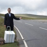 One man, his thumb and a fridge on a mission